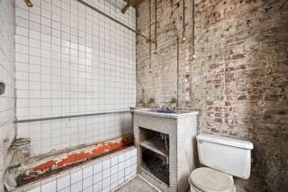 bathroom featuring toilet