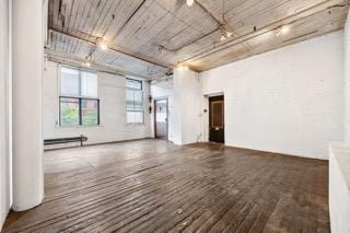 spare room with wood finished floors