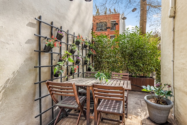 balcony featuring outdoor dining area