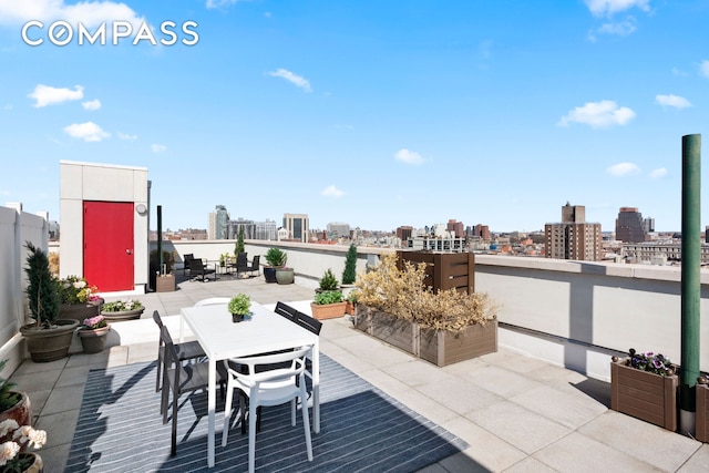 301 W 115th St Unit Ph4C, New York City, NY 10026 - view of patio / terrace with a skyline view and outdoor dining space