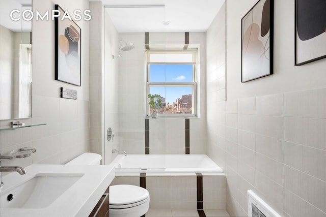 301 W 115th St Unit Ph4C, New York City, NY 10026 - full bath with tile walls, toilet, tiled shower / bath combo, and vanity