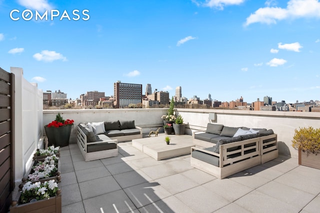 301 W 115th St Unit Ph4C, New York City, NY 10026 - view of patio with a view of skyline and an outdoor hangout area