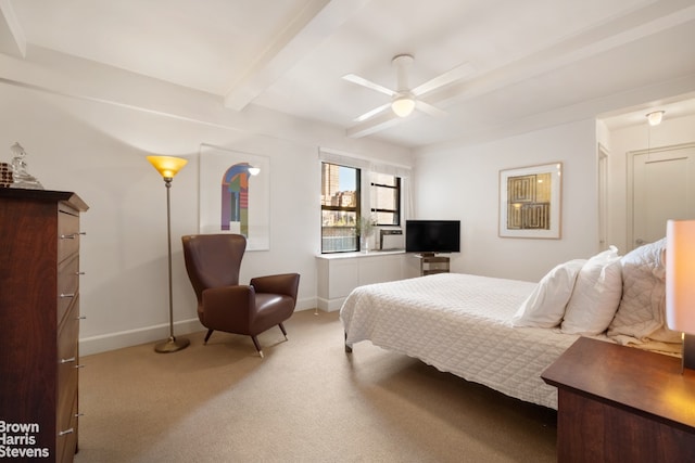 carpeted bedroom with beamed ceiling, baseboards, and ceiling fan