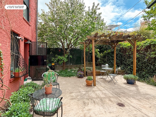 420 Classon Ave Unit C, New York City, NY 11238 - view of patio / terrace with a fenced backyard and a pergola