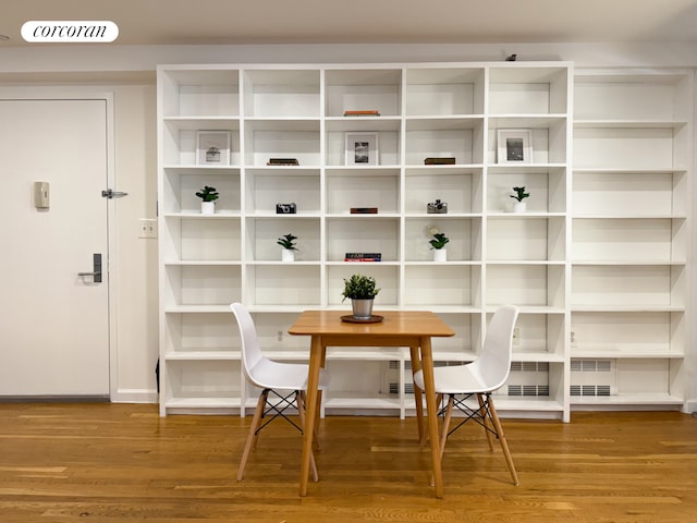 420 Classon Ave Unit C, New York City, NY 11238 - dining room featuring visible vents, baseboards, and wood finished floors