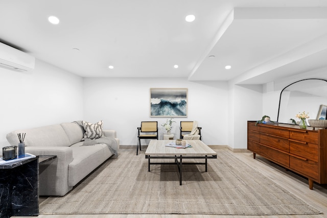 256 Putnam Ave Unit 1, New York City, NY 11216 - living area featuring a wall mounted air conditioner, recessed lighting, and light wood finished floors