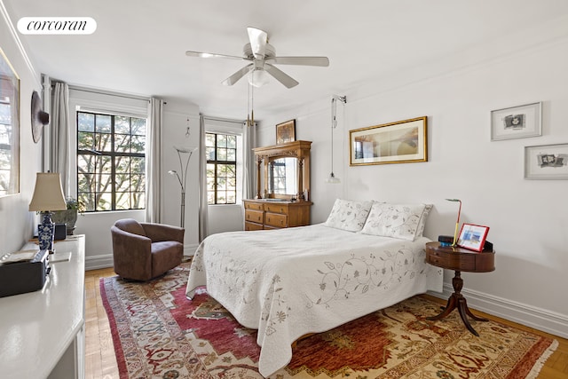116 Pinehurst Ave Unit C15, New York City, NY 10033 - bedroom featuring wood finished floors and a ceiling fan