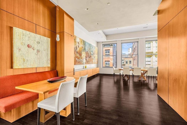 dining area with wood finished floors