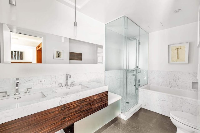 92 Greene St Unit 4, New York City, NY 10012 - bathroom with a sink, a marble finish shower, a bath, and toilet