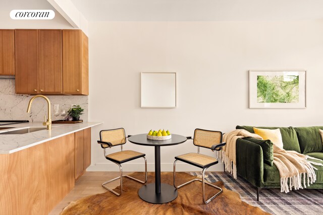 259 Rutland Rd Unit 2A, New York City, NY 11225 - dining space with light wood-style flooring