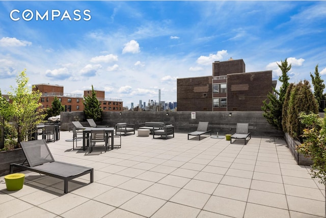 view of patio featuring a skyline view