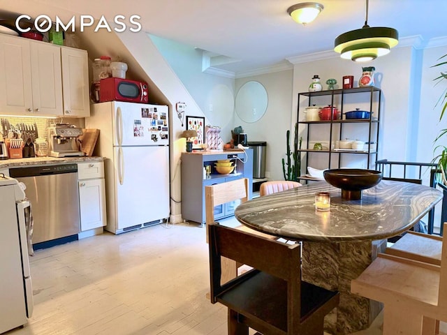 269 Ainslie St, New York City, NY 11211 - dining room with crown molding and light wood finished floors