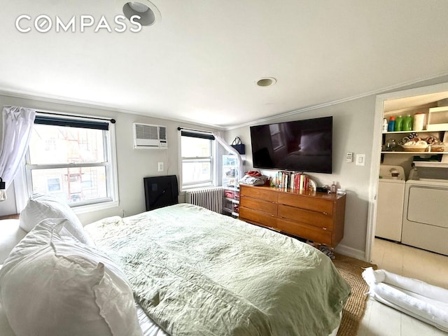 269 Ainslie St, New York City, NY 11211 - bedroom with a wall mounted air conditioner, ornamental molding, radiator, baseboards, and washing machine and dryer