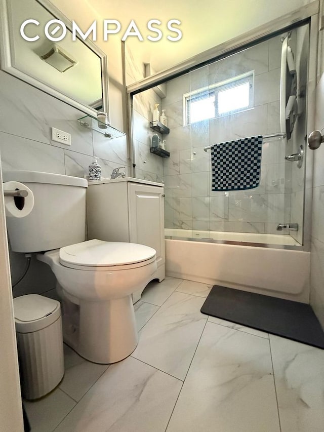 269 Ainslie St, New York City, NY 11211 - bathroom with shower / bath combination with glass door, toilet, and marble finish floor