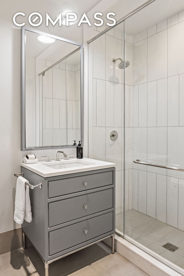 378 W End Ave Unit 11B, New York City, NY 10024 - full bath with tile patterned floors, a shower stall, and vanity