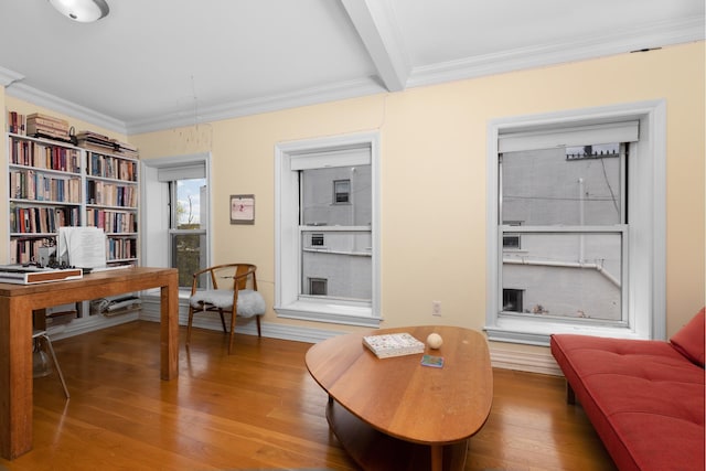 6 3rd St, New York City, NY 11231 - living area featuring crown molding, beam ceiling, and wood finished floors