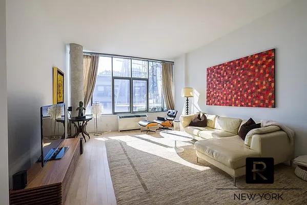 sitting room featuring wood finished floors