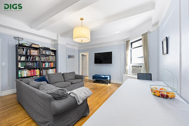 760 W End Ave Unit 1A, New York City, NY 10025 - living area with beamed ceiling, cooling unit, and light wood finished floors