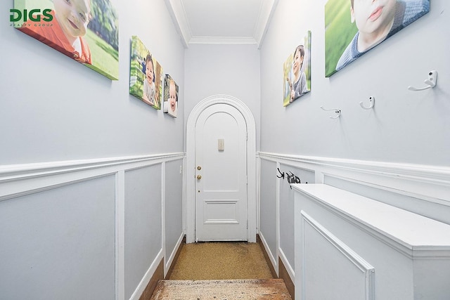 760 W End Ave Unit 1A, New York City, NY 10025 - entryway with crown molding, a decorative wall, and wainscoting