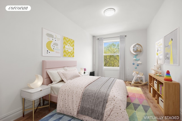 720 W 173rd St Unit 32, New York City, NY 10032 - bedroom featuring wood finished floors and baseboards