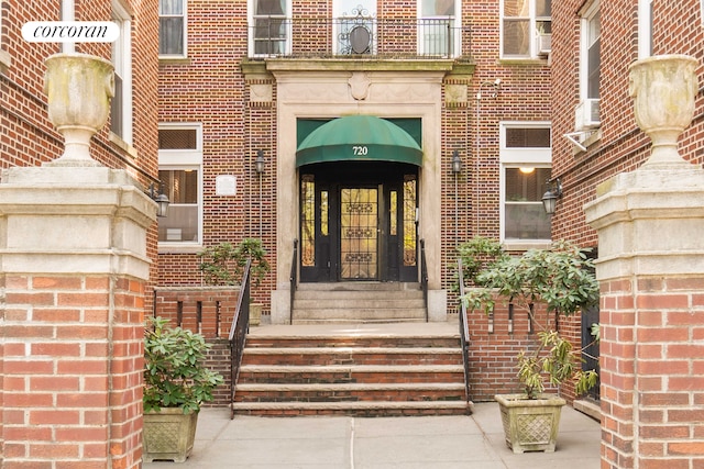 720 W 173rd St Unit 32, New York City, NY 10032 - property entrance featuring brick siding