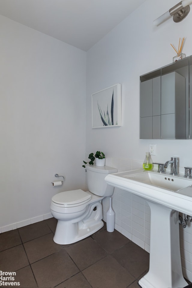 365 Bridge St Unit 23C, New York City, NY 11201 - half bath with toilet, tile patterned floors, and a sink