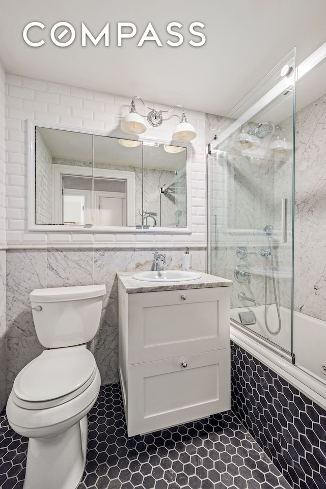118 Union St Unit 9A, New York City, NY 11231 - full bath featuring tiled shower / bath, vanity, and tile walls