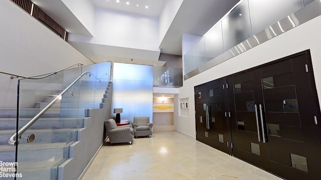 15 W 53rd St Unit 27E, New York City, NY 10019 - community lobby with a towering ceiling
