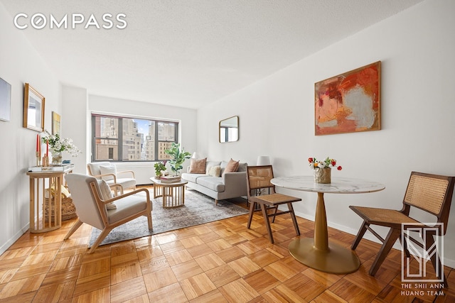 living room featuring baseboards