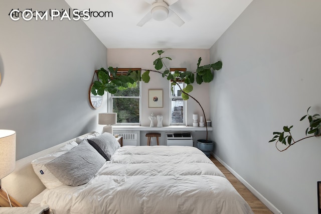 126 W 78th St, New York City, NY 10024 - bedroom featuring wood finished floors, baseboards, and a ceiling fan