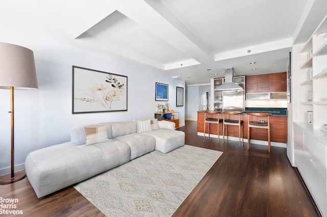 living area with dark wood-style floors and baseboards