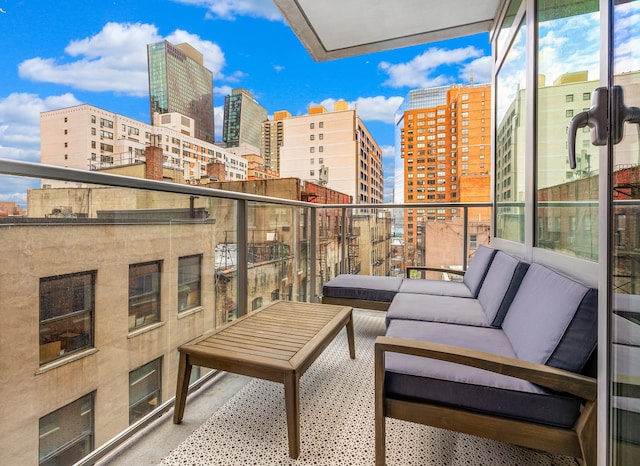 303 E 33rd St Unit 7C, New York City, NY 10016 - balcony featuring a view of city and an outdoor hangout area