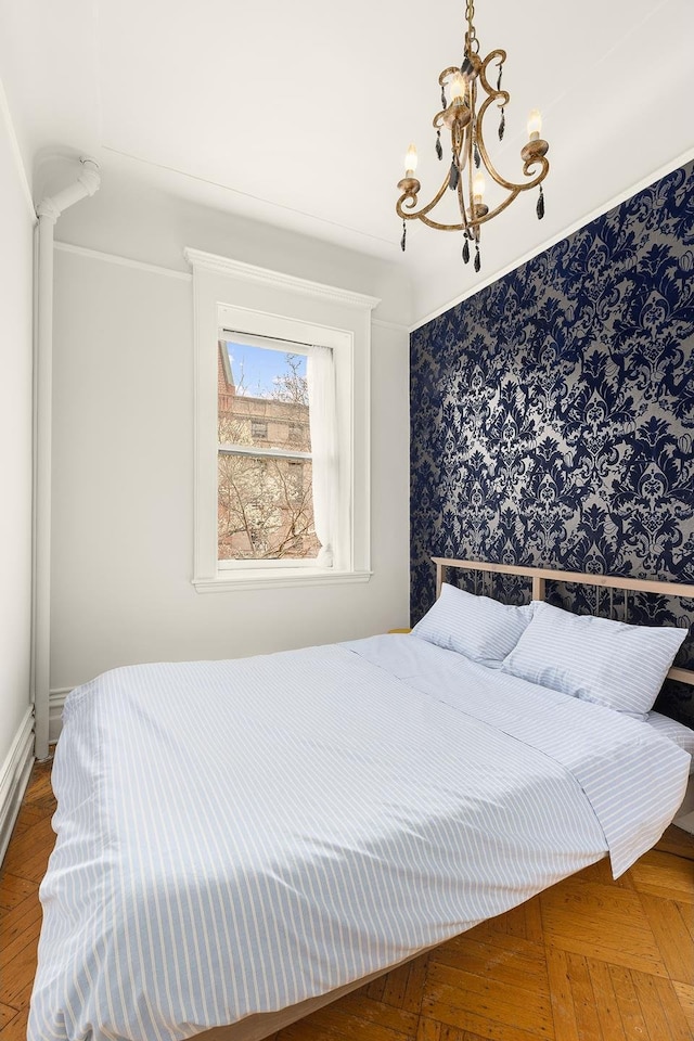 bedroom with a chandelier
