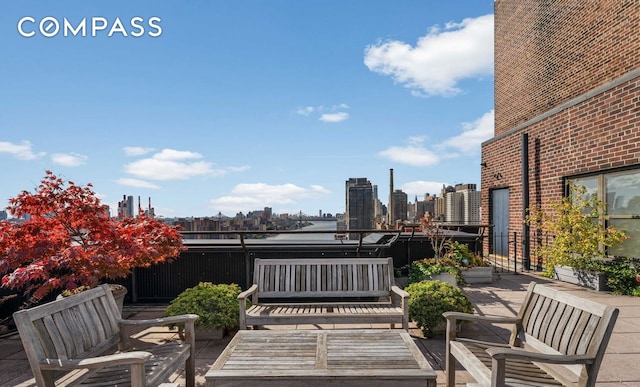 45 E End Ave Unit 10F, New York City, NY 10028 - view of patio featuring a view of skyline