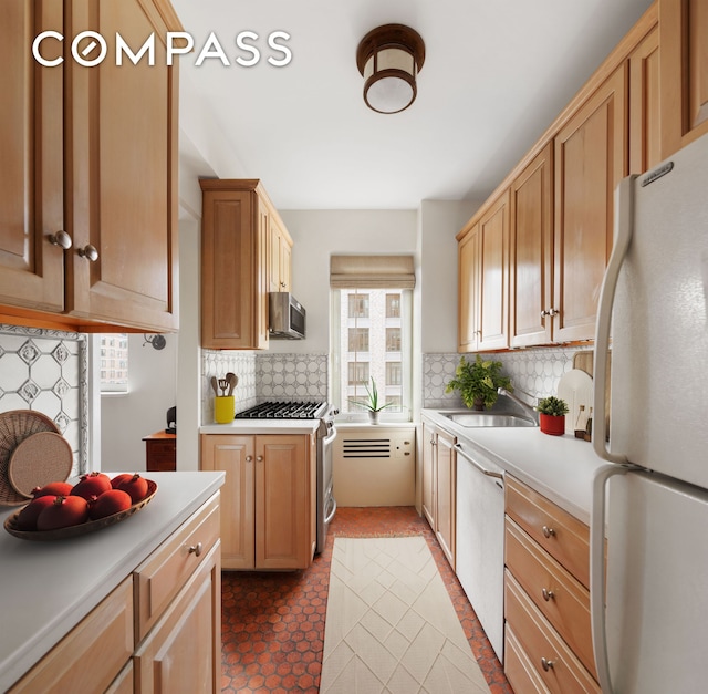 45 E End Ave Unit 10F, New York City, NY 10028 - kitchen featuring white appliances, tasteful backsplash, a sink, and light countertops