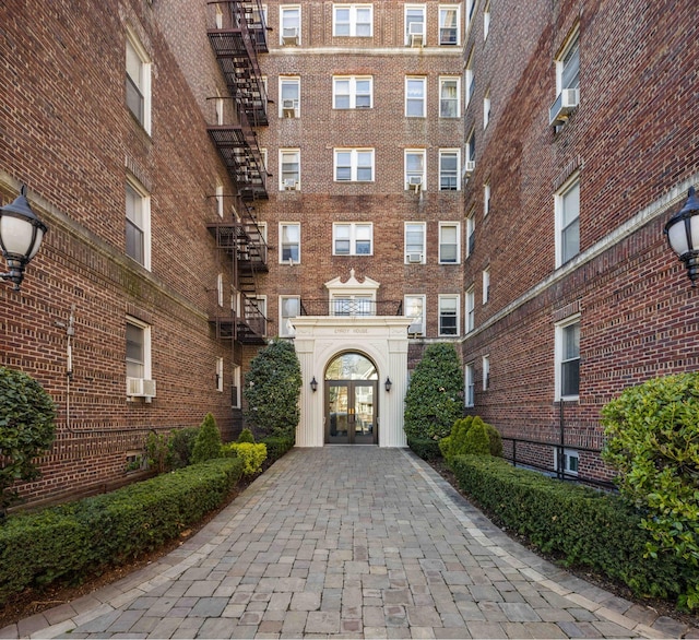 view of apartment building / complex featuring cooling unit