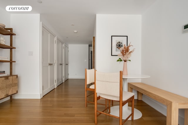 136 E 19th St Unit 1W, New York City, NY 10003 - dining area with wood finished floors and baseboards