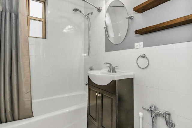 67-25 Clyde St Unit 1G, New York City, NY 11375 - bathroom with vanity, shower / bath combination with curtain, and tile walls