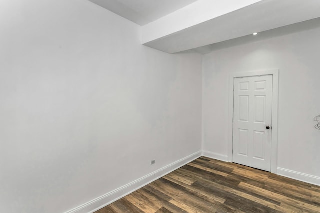 67-25 Clyde St Unit 1G, New York City, NY 11375 - empty room with baseboards and dark wood-type flooring