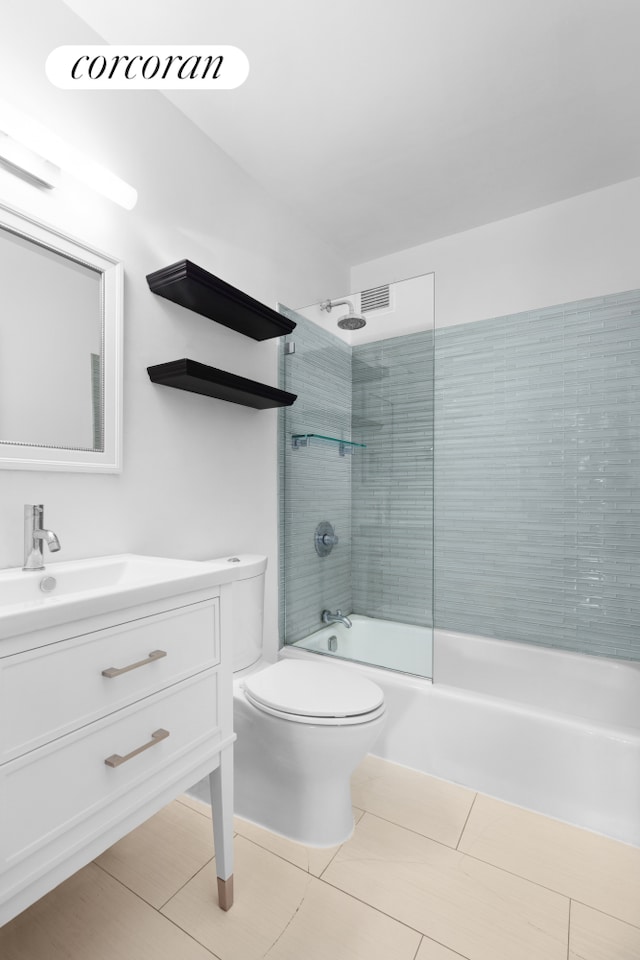 420 W 23rd St Unit 9B, New York City, NY 10011 - bathroom featuring vanity, shower / bath combination, and tile patterned flooring