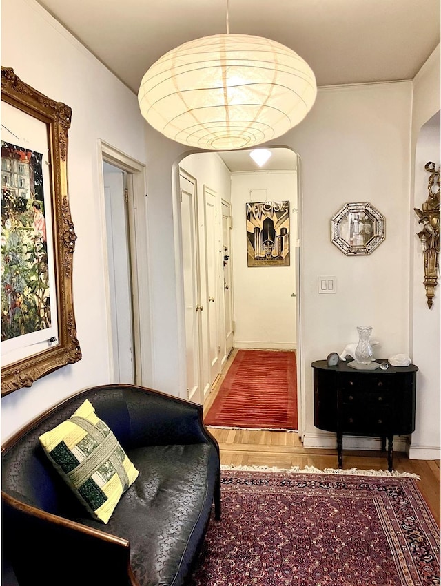 30 Bogardus Pl Unit 2B, New York City, NY 10040 - corridor featuring arched walkways and wood finished floors