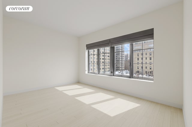 959 1st Ave Unit 6G, New York City, NY 10022 - empty room with baseboards
