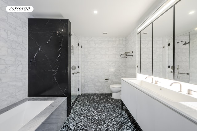 959 1st Ave Unit 6G, New York City, NY 10022 - full bath with tile walls, toilet, a stall shower, vanity, and a bath