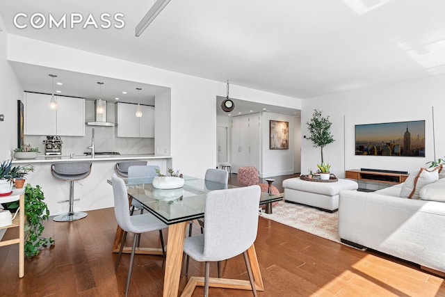 dining area featuring hardwood / wood-style floors