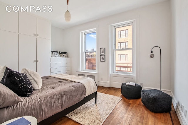 391/2 Washington Sq S Unit 9, New York City, NY 10012 - bedroom featuring hardwood / wood-style floors and baseboards