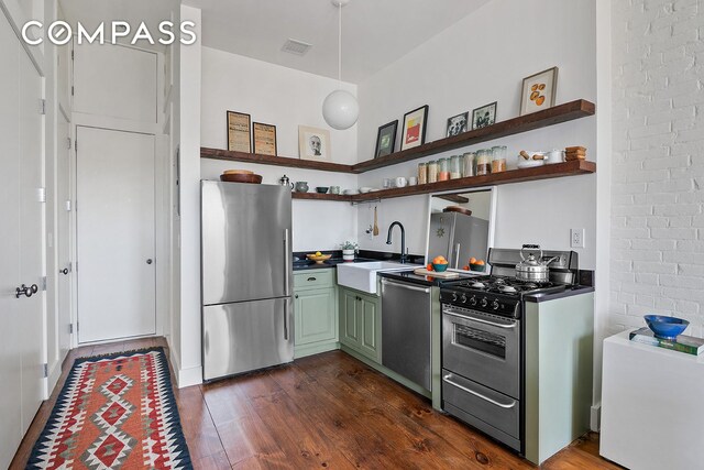 940 Fulton St Phd, Phd, New York City, NY 11238 - kitchen with stainless steel appliances, open shelves, a sink, green cabinets, and dark wood finished floors