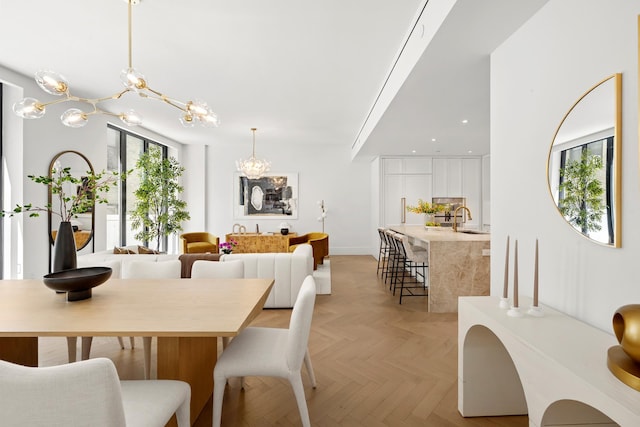 2505 Broadway Unit 2B, New York City, NY 10025 - dining room with baseboards, recessed lighting, and a notable chandelier