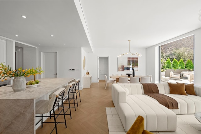 2505 Broadway Unit 2B, New York City, NY 10025 - living room featuring recessed lighting, baseboards, and a chandelier