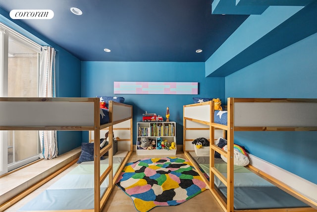 bedroom featuring multiple windows and recessed lighting