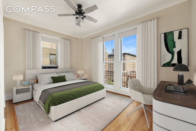 530 W End Ave Unit 9B, New York City, NY 10024 - bedroom featuring wood-type flooring, ornamental molding, and a ceiling fan
